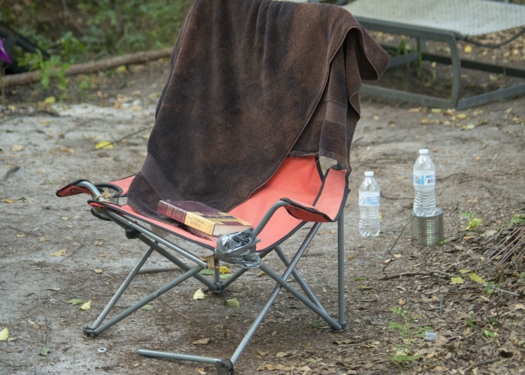 The King James version of the Bible on a lawn chair